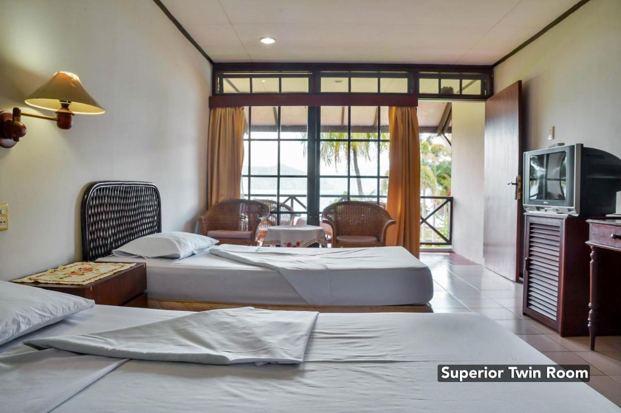 Silintong Hotel Ambarita Экстерьер фото